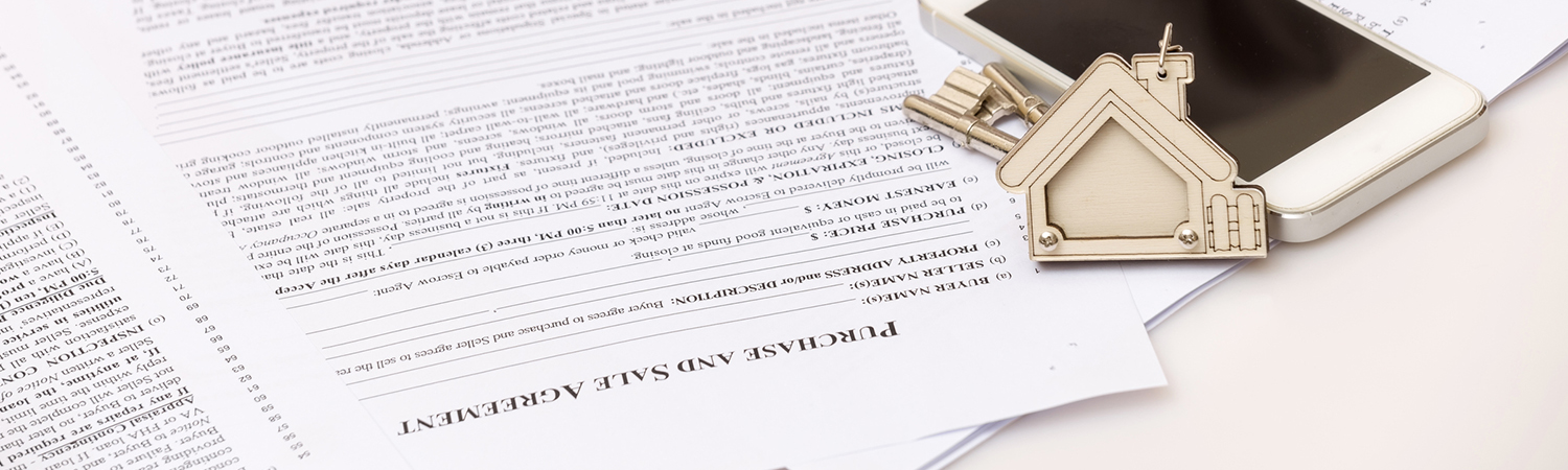 Real Estate Contract, Keys and Cell Phone